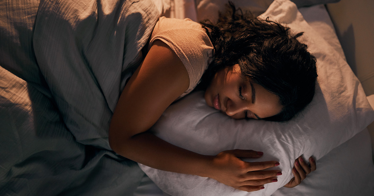 Woman sleeping in bed