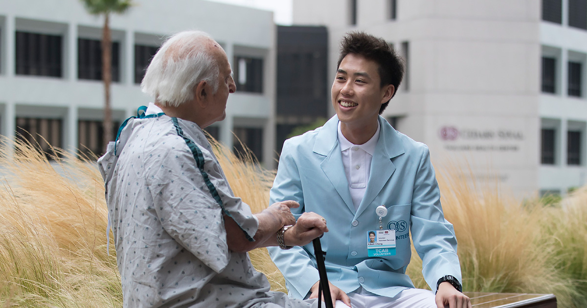 Cedars-Sinai volunteer with patient